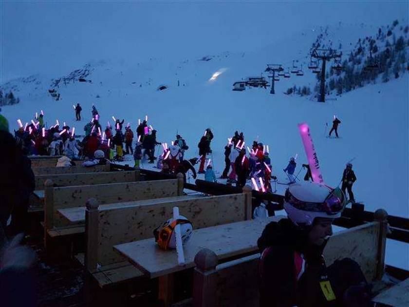 I light, skiing for breast cancer